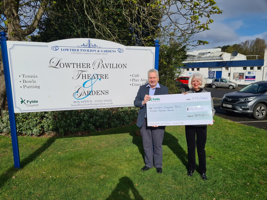 Cllr Sue Fazackerley [R] presents cheque to David Roe, Trustee of Lowther Gardens Trust.